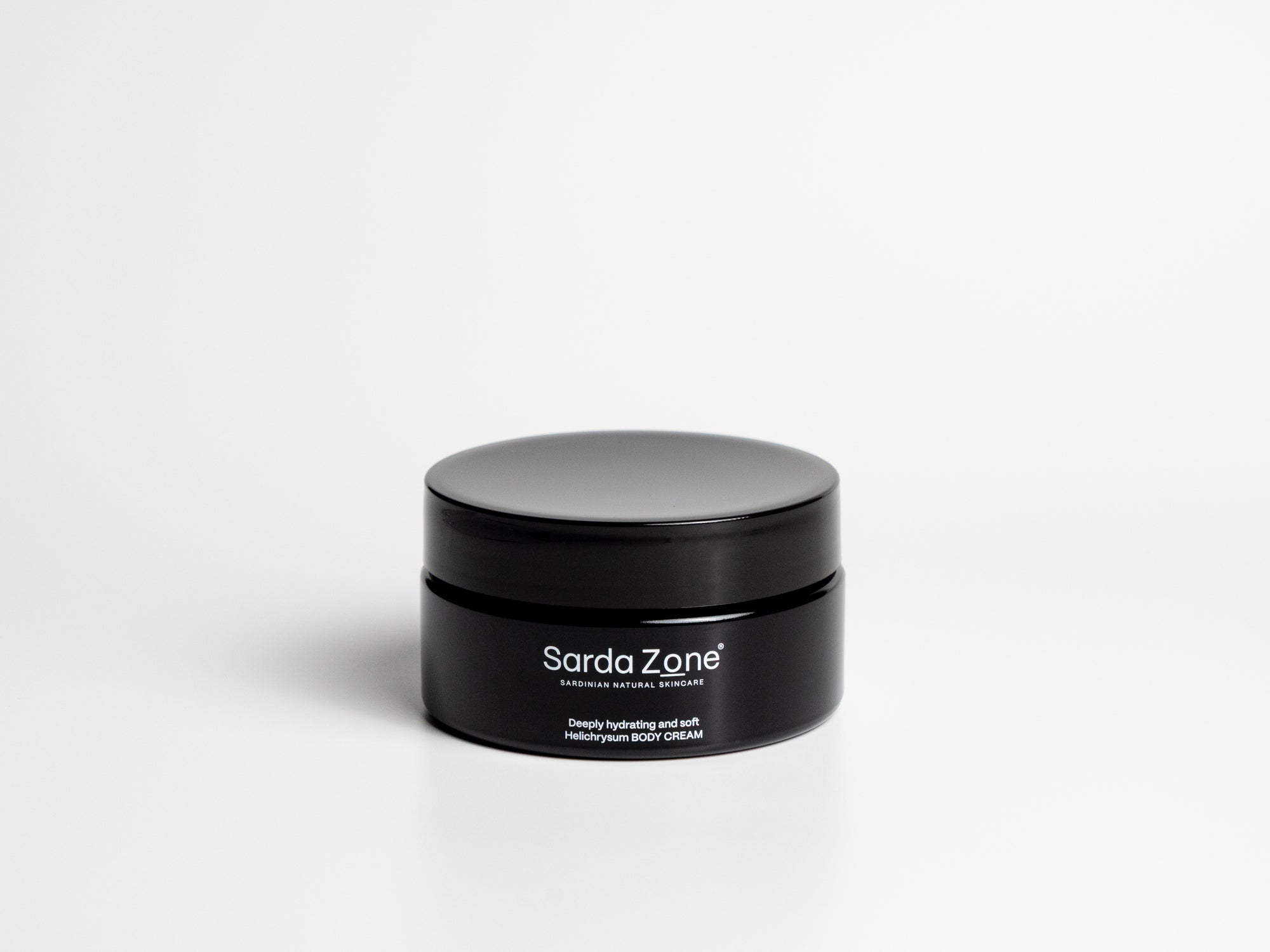 Sarda Zone Helichrysum Body Cream in a black jar